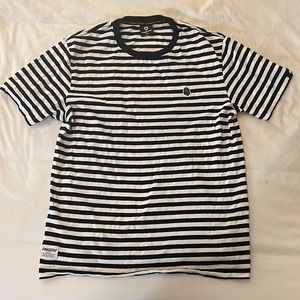 Black and white striped tee. Sixe XL but runs very small